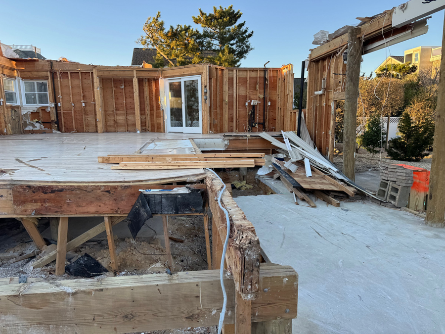 The existing house opened up where the addition ties in