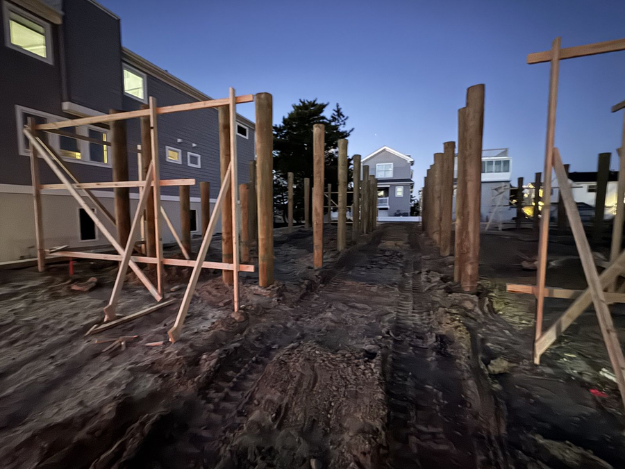 Piling bracing in place down the length of the lot