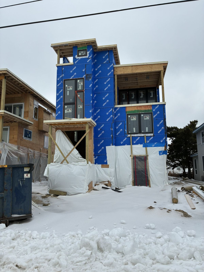 Wrapped front elevation after the snowfall