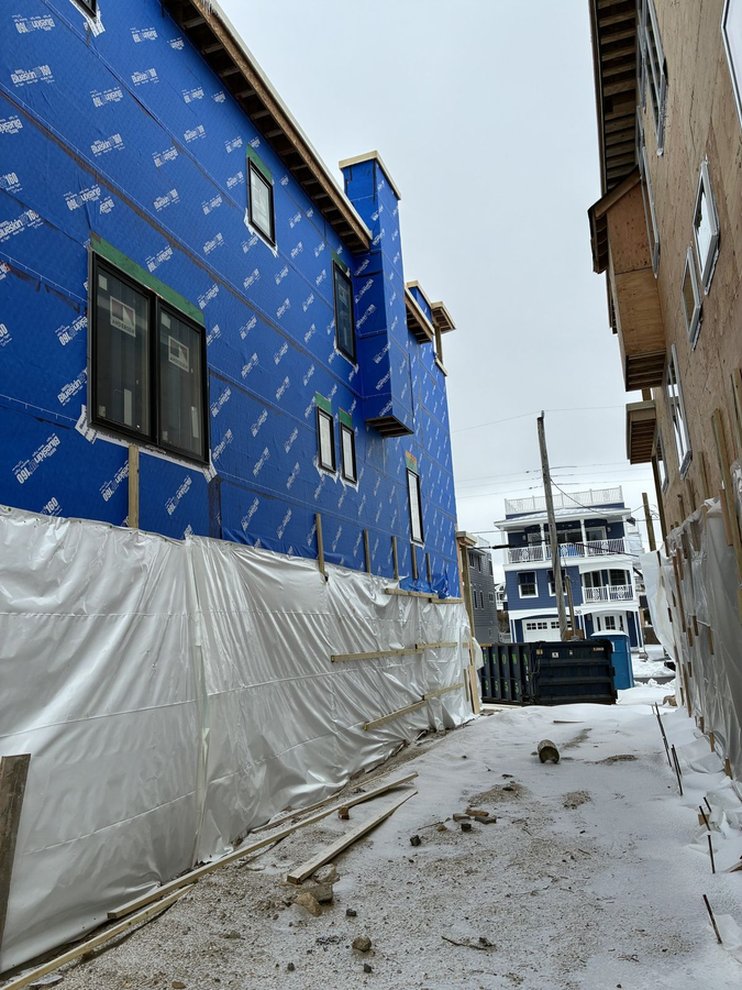 Side view down the narrow lot