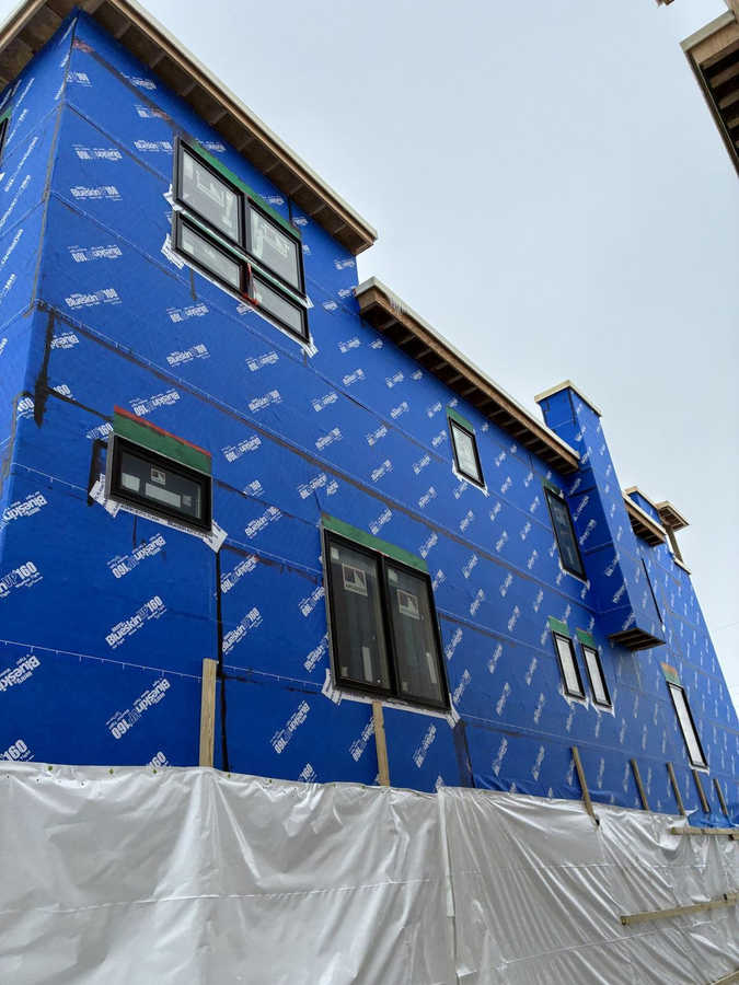 Wrapped home with the lower level protected