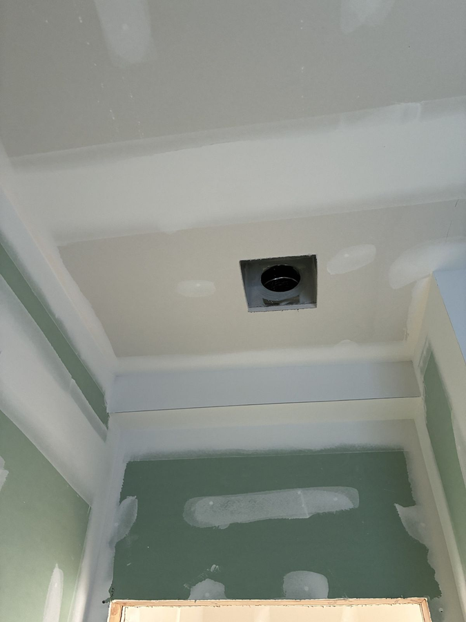 Ceiling with exhaust fan and recessed lights roughed in