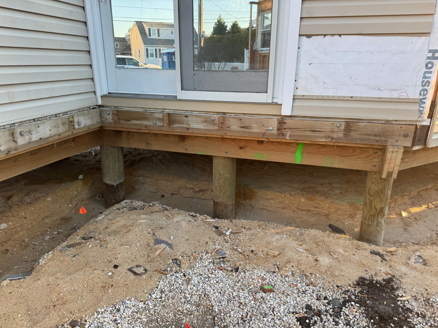 Existing floor framing at the rear of the house