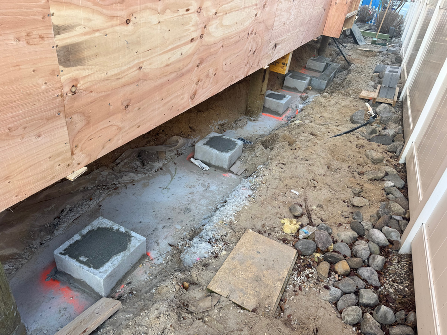 New framing tied in above the pilings