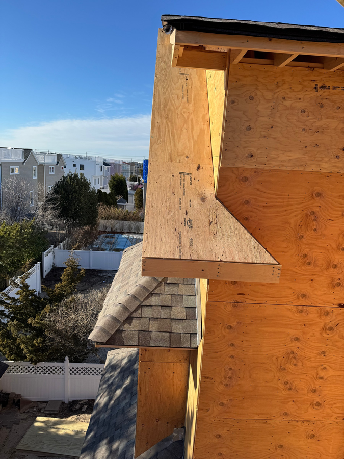 Sheathing on an upper corner