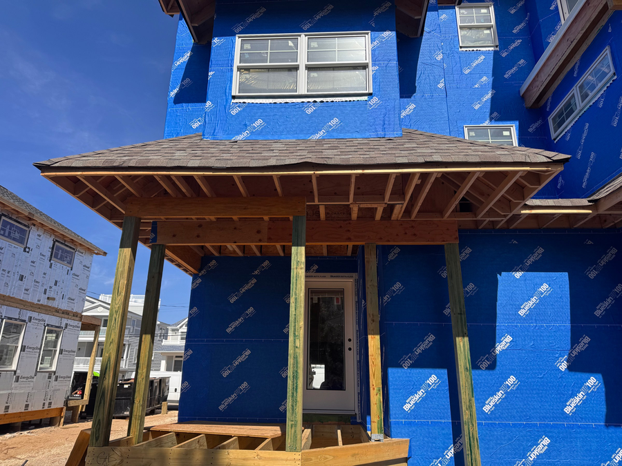 House wrap and the covered porch roof