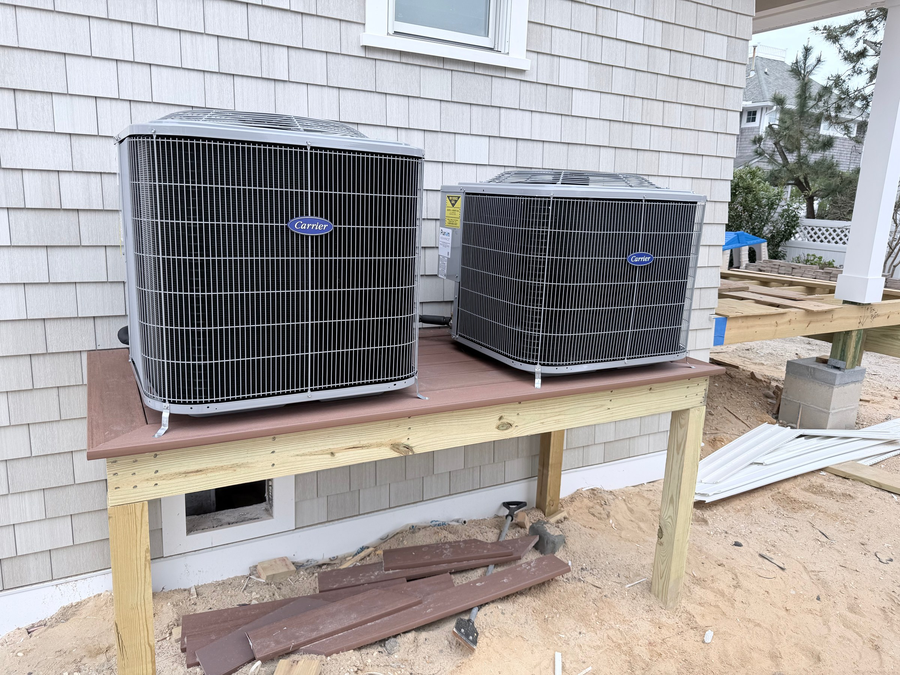 Air conditioning condensers on a raised platform