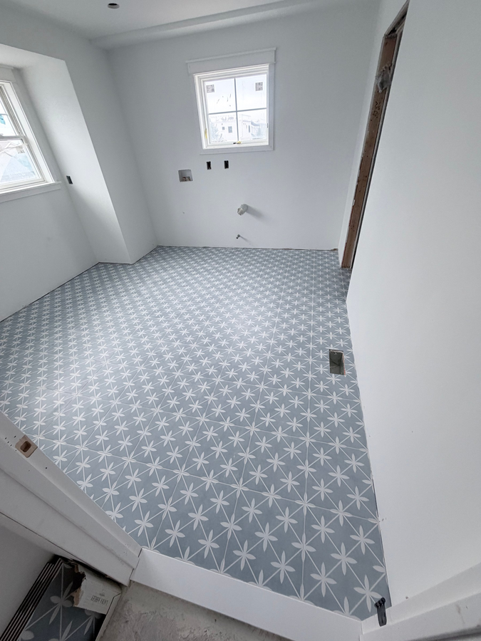 Patterned tile floor in a bathroom
