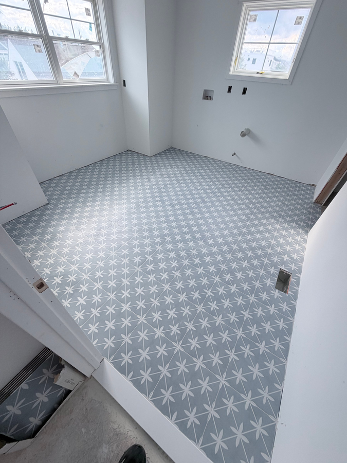 Patterned tile laid